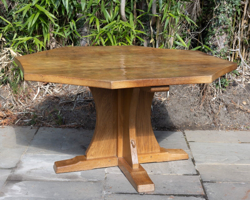 ROBERT 'MOUSEMAN' THOMPSON OF KILBURN - LARGE ADZED OAK OCTAGONAL DINING TABLE