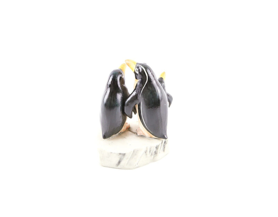 GUIDO CACCIAPUOTI - PEGUIN GROUP ON ICE, ITALIAN PORCELAIN FIGURE MODEL, SIGNED