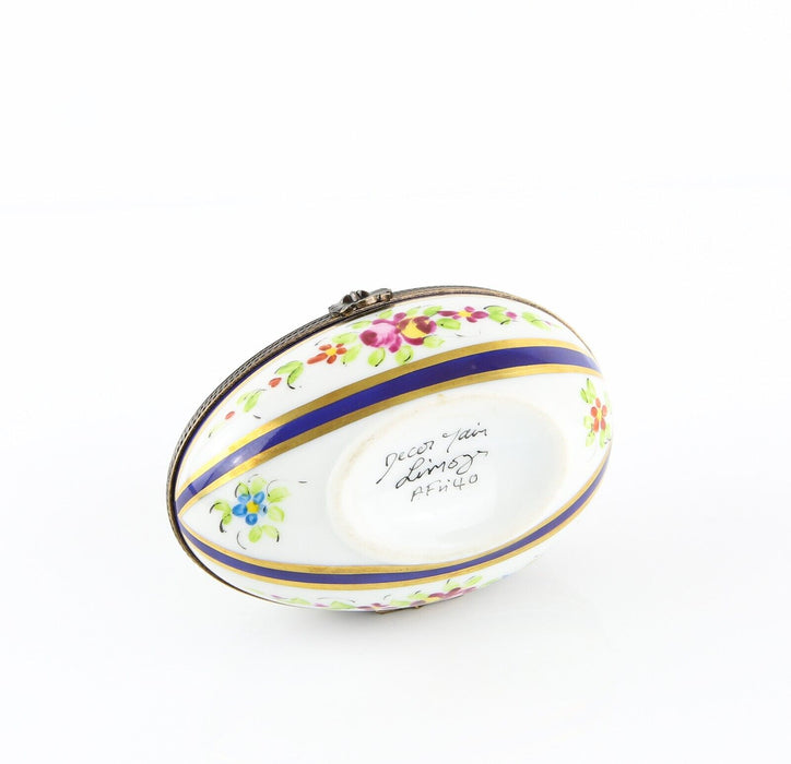 LIMOGES, FRANCE BLUE STRIPE FLORAL EGG SHAPED ENAMEL PILL TRINKET BOX