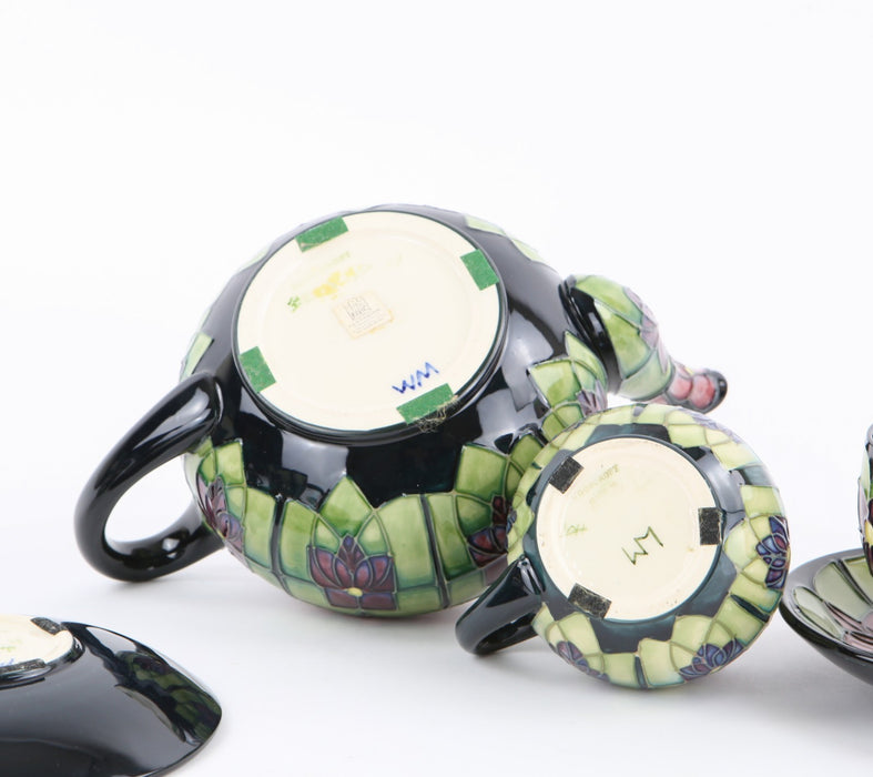 MOORCROFT POTTERY 'VIOLET' SALLY TUFFIN TETE-Á-TETE FLORAL TEA SET, BOXED