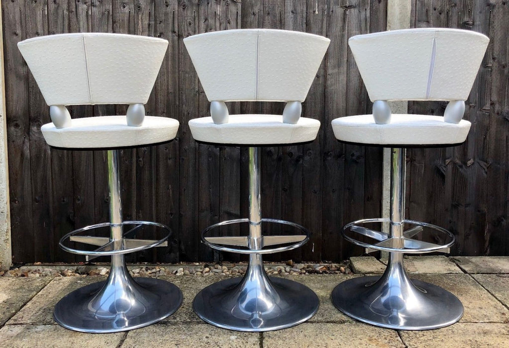LEON KRIER for GIORGETTI, SET OF SIX DESIGNER OSTRICH LEATHER 'TAURUS' BAR STOOLS