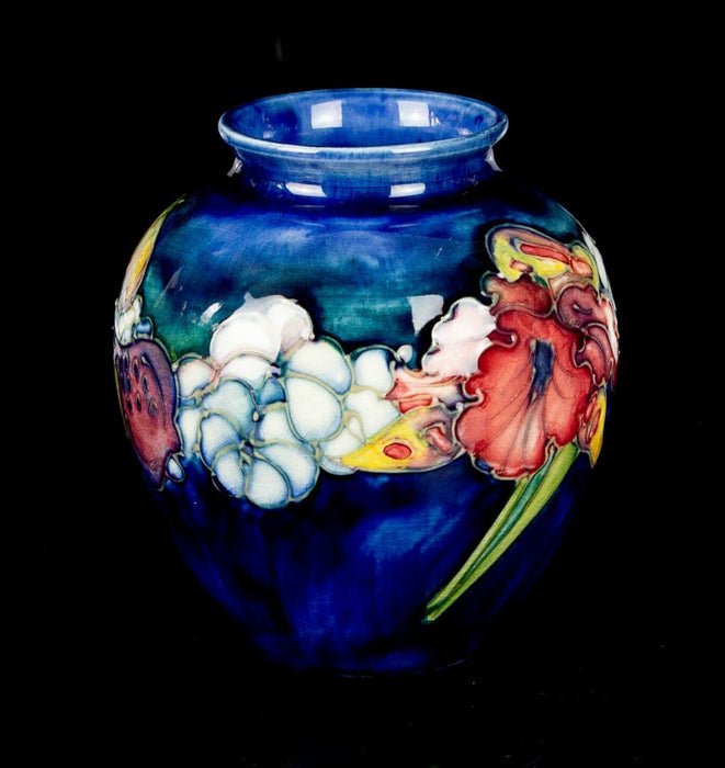 MOORCROFT POTTERY -FRILLED ORCHID- EARLY C20TH BLUE GROUND FLORAL BALUSTER VASE