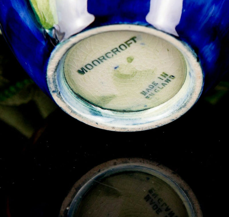 MOORCROFT POTTERY -FRILLED ORCHID- EARLY C20TH BLUE GROUND FLORAL BALUSTER VASE