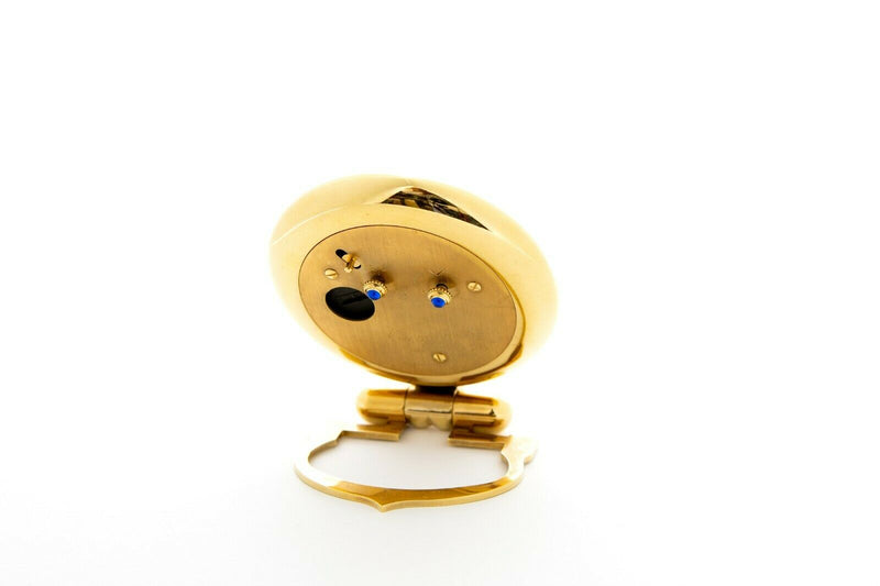 MUST DE CARTIER -COLISEE- FOLDING DESK TRAVEL ALARM CLOCK, QUARTZ, GILT CASE