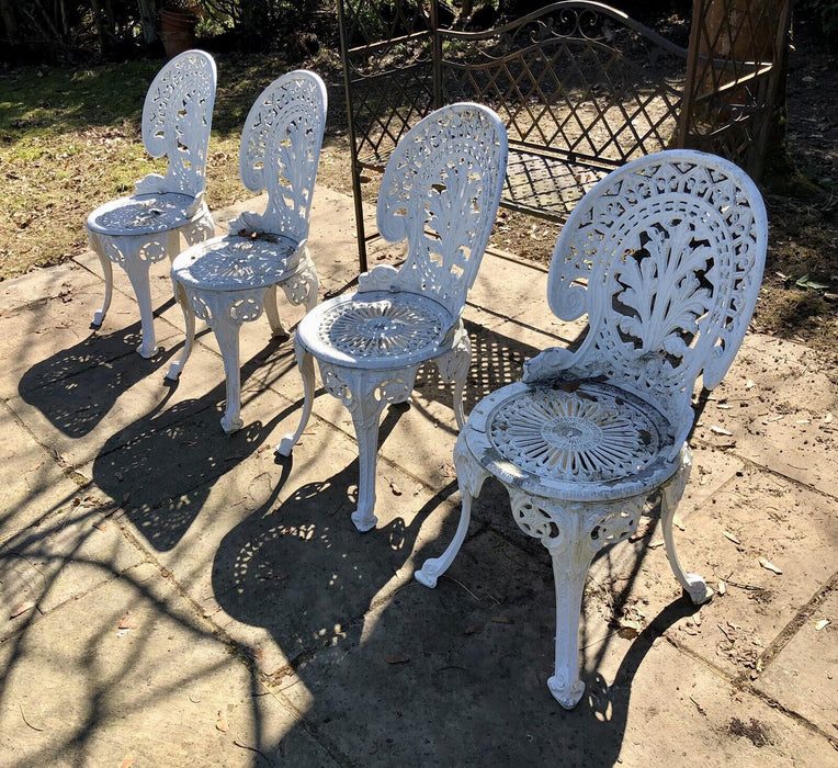 SET OF FOUR COALBROOKDALE STYLE CAST METAL GARDEN CHAIRS