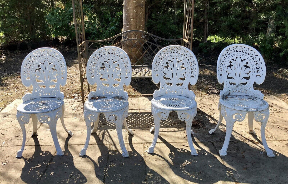 SET OF FOUR COALBROOKDALE STYLE CAST METAL GARDEN CHAIRS